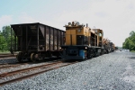 Loram digger sits next to 22 tie gons in Greencastle Yard